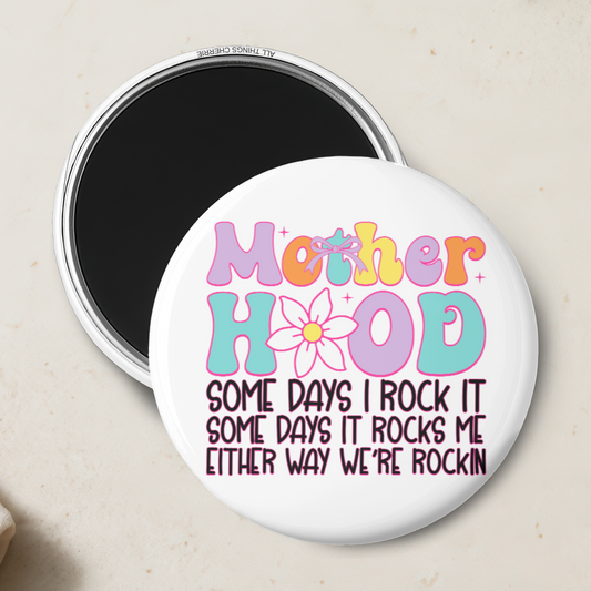 "Motherhood: Some Days I Rock It, Some Days It Rocks Me, Either Way We're Rocking" Magnet